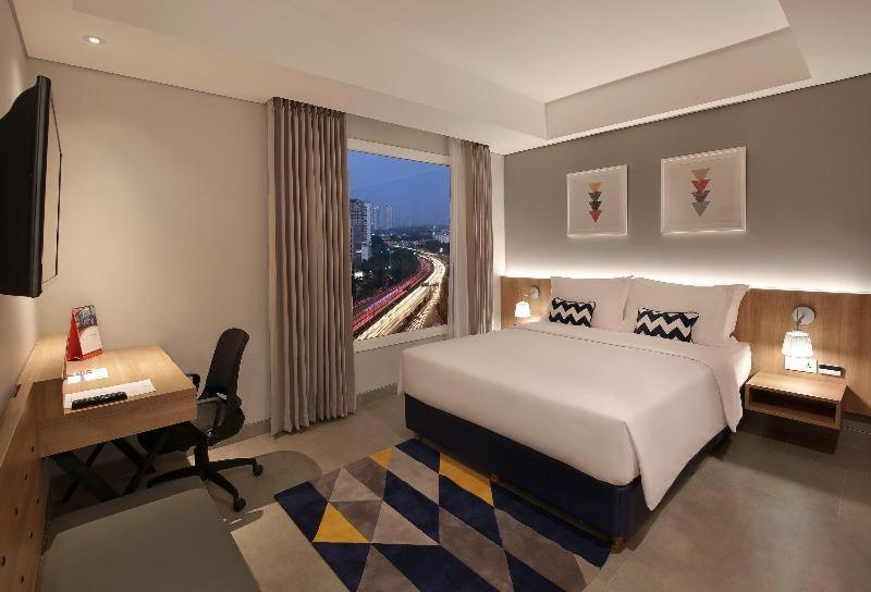 Swiss-Belinn Simatupang Джакарта Номер фото